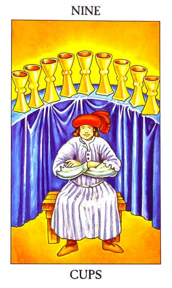 What Does the Nine of Cups Tarot Mean? Fulfillment, Happiness & Desire Realized